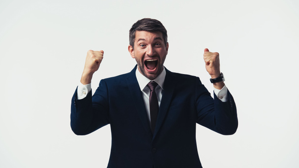 Excited manager with open mouth showing yes gesture isolated on white - Valokuva, kuva
