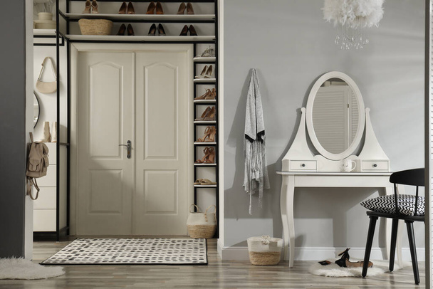Dressing room interior with storage rack for shoes and accessories - Zdjęcie, obraz