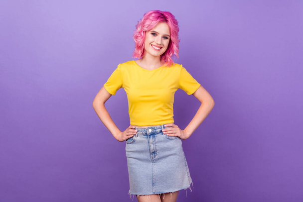 Photo of young attractive girl happy positive smile cool confident wear casual outfit isolated over purple color background - Foto, imagen