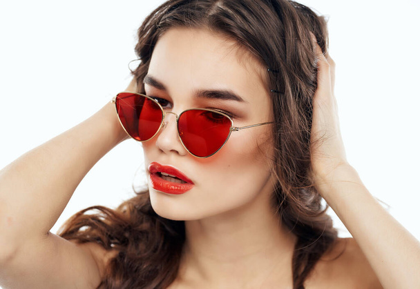 Attractive Brunette Wearing Sunglasses . High quality photo - Photo, image