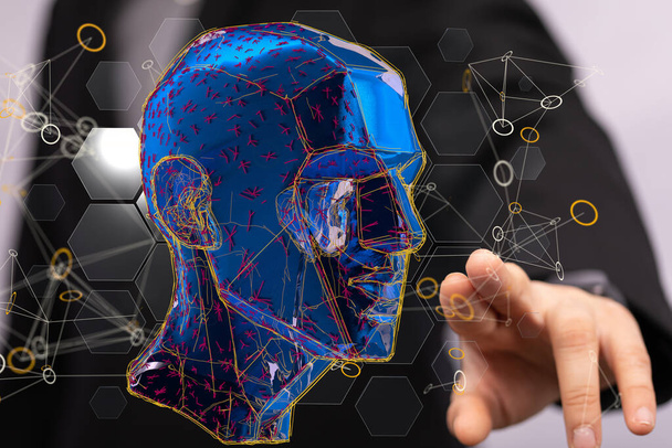 A closeup of a 3D rendering polygonal human face hologram on a man's hand - Foto, Bild