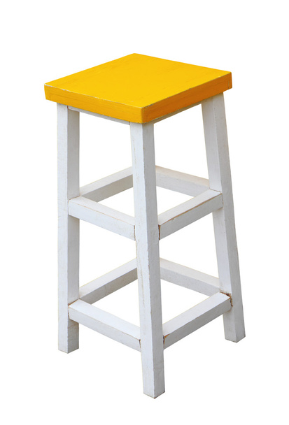 White and yellow wooden stool isolated by hand made clipping pat - 写真・画像