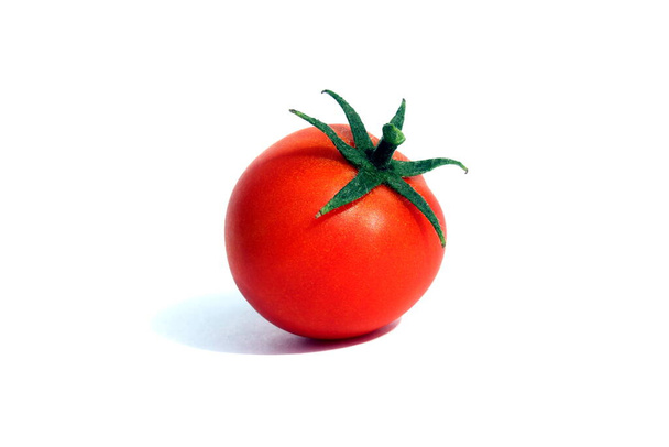 Ripe red tomato on a white isolated background. - Foto, immagini