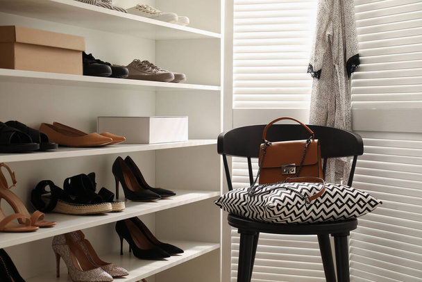 Dressing room interior with storage rack for shoes and accessories - Fotografie, Obrázek