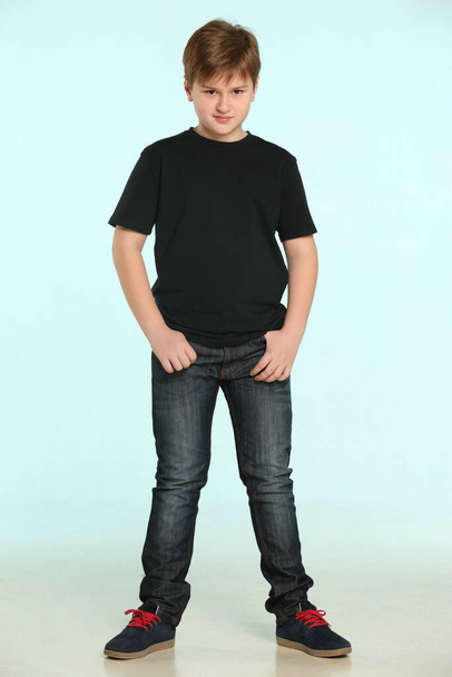 In the portrait smart and serious teenager standing in full length with his hands in his pockets. - Fotoğraf, Görsel