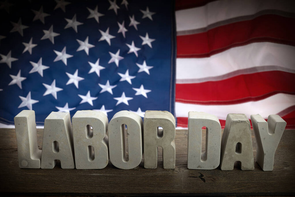 Happy Labor Day banner. USA flag and letters on rustic wooden background. - Fotoğraf, Görsel