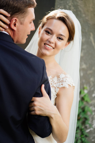 bride and groom dance, hug and smile. beautiful and happy wedding in open air.  - Photo, image