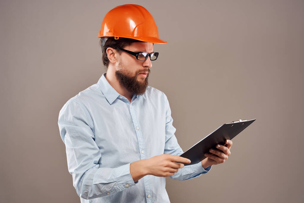 bearded man work in the construction industry protective uniform - Фото, зображення