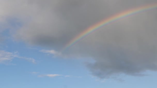 natural phenomenon bright colorful rainbow in the clouds - Footage, Video