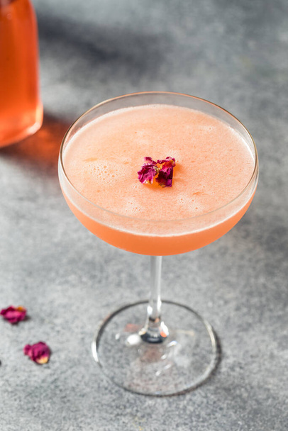 Cold Refreshing Rose Petal Cocktail with Gin and Lemon - Photo, Image