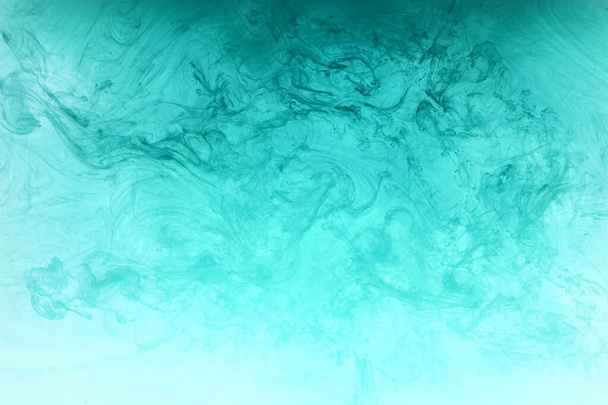 Abstract blue-green ocean, paint in water background. swirl of splashes and waves in motion. Fluid art wallpaper, liquid vibrant colors - Fotografie, Obrázek