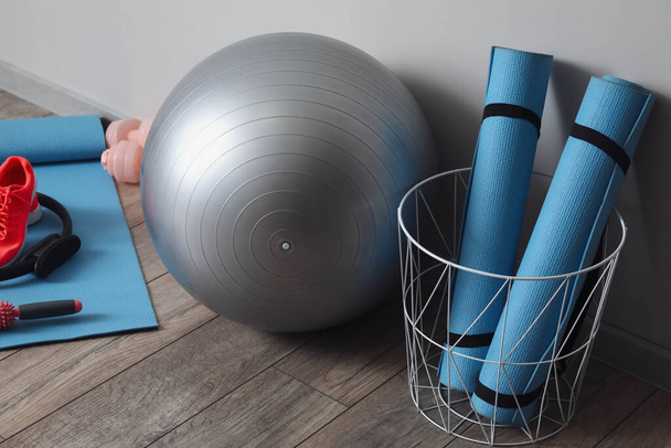 Set of sports equipment on floor in gym - Fotografie, Obrázek