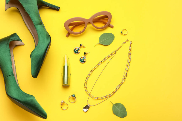 Set of female accessories, shoes and lipstick on color background - Φωτογραφία, εικόνα