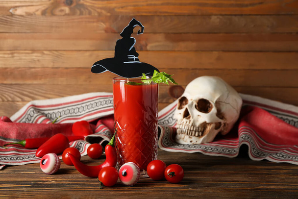 Glass of tasty bloody Mary cocktail decorated for Halloween on wooden background - Photo, Image
