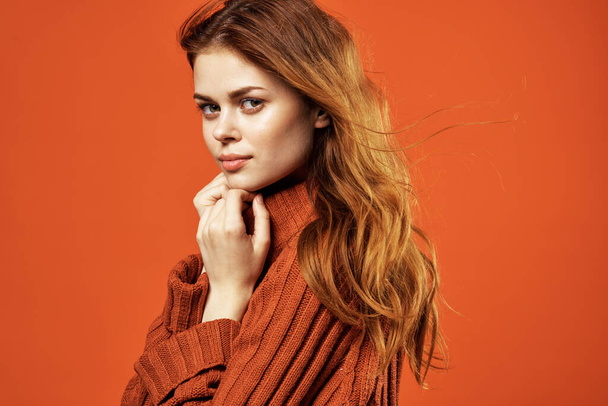 woman in red sweater glamor fashion posing isolated background - 写真・画像