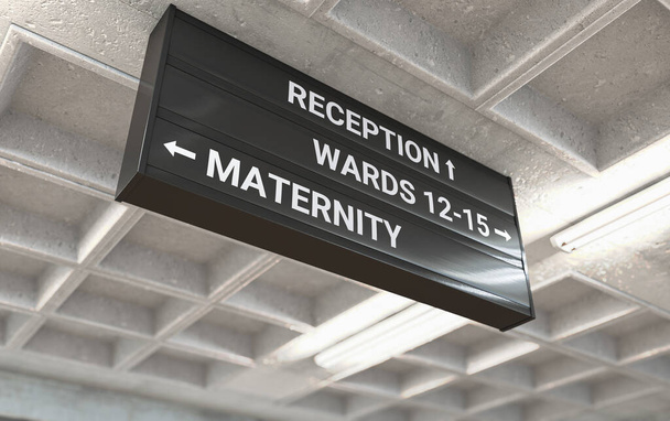 A hospital directional sign mounted on a cast concrete ceiling highlighting the way towards the maternity ward - 3D render - Photo, Image