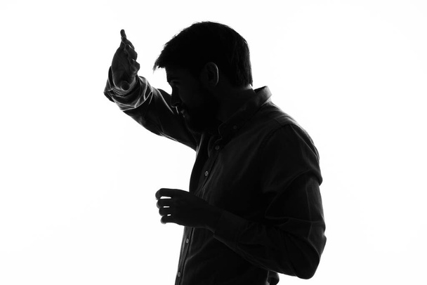 Geschäftsleute Geheimagent mit Waffe in der Hand eines Verbrechens isoliert Hintergrund - Foto, Bild