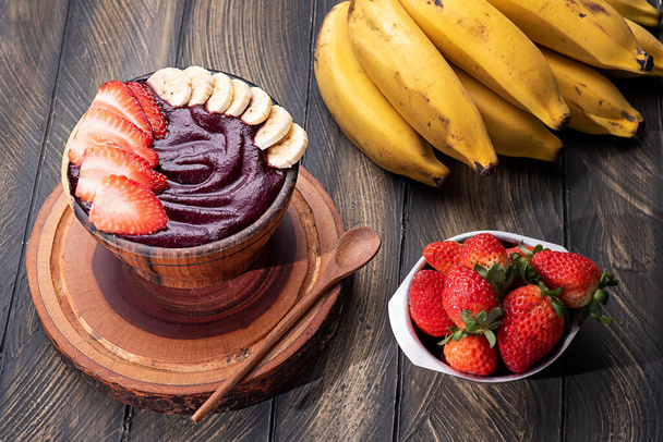 Acai bowl with strawberry and banana topping - Photo, Image
