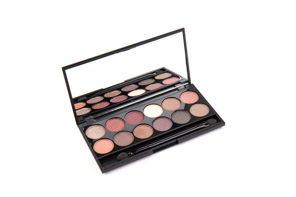 The concept of makeup and office dresscode. nude palette of shadows with beige, rose and brown shades on white background top view - Valokuva, kuva