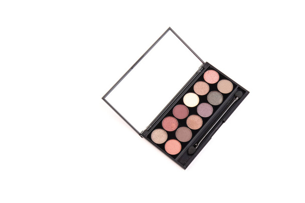 The concept of makeup and office dresscode. nude palette of shadows with beige, rose and brown shades on white background top view - Photo, Image
