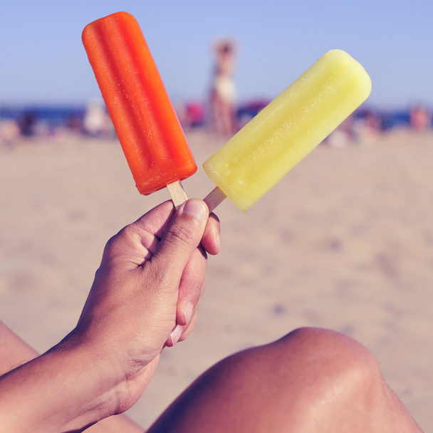 ice pops on the beach, with a filter effect - Photo, Image
