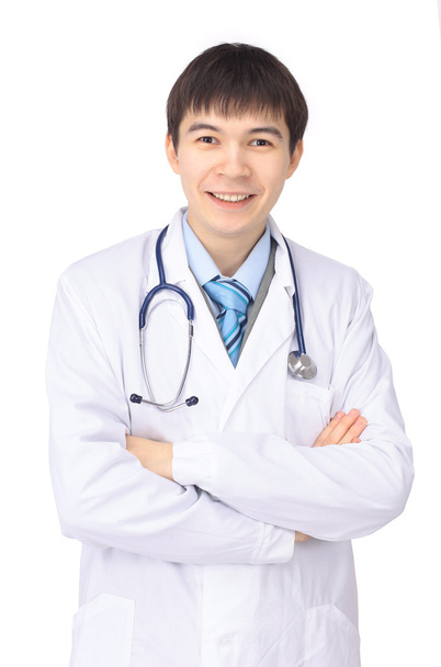 A portrait of a medical doctor posing against white background - Фото, зображення