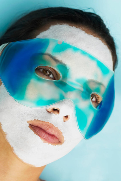 woman applying facial mask on face, closeup - Foto, Imagem