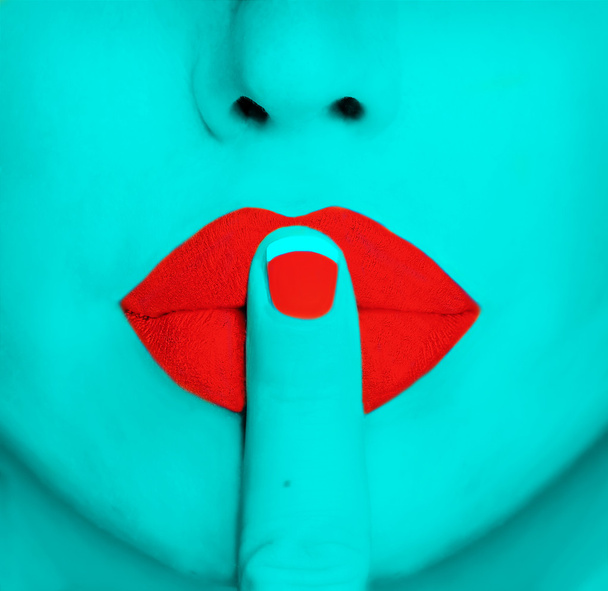 Finger on red lips - Photo, image
