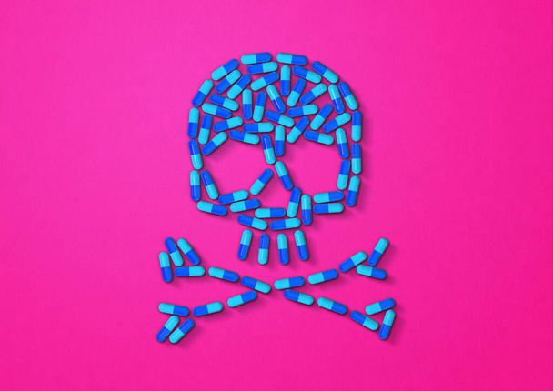 Skull made of blue capsule pills isolated on pink background. 3D illustration - Valokuva, kuva