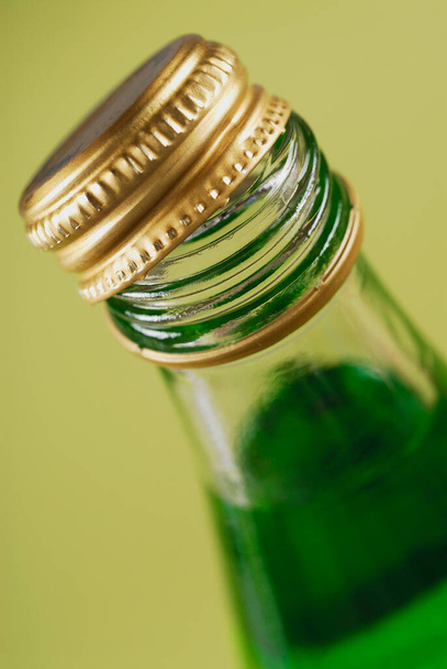 green beer bottle with reflection on a white background - Photo, image