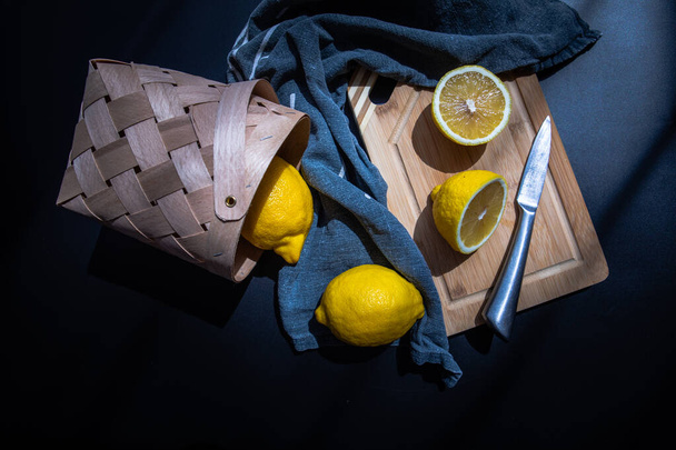 sliced lemons on cut board flat lay fruits - Photo, Image