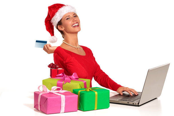 Mujer de Navidad en el ordenador portátil haciendo compras por Internet - Foto, imagen