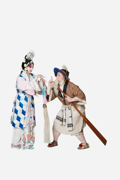Mid adult man and a mature woman wearing traditional clothing - Foto, afbeelding