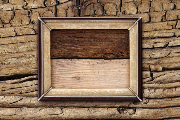 Ancien cadre sur un fond en bois
 - Photo, image