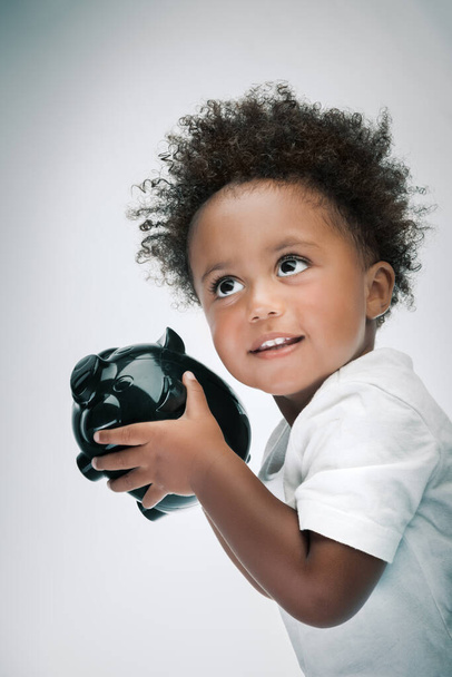 portrait of a cute little boy with a toy camera - Photo, Image