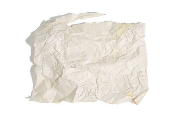 piece of crumpled white paper with torn edges isolated on white background, element for designer, top view - Foto, Bild