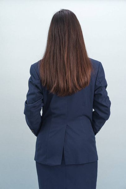 young beautiful woman in a suit with a large smile on her back - Фото, зображення