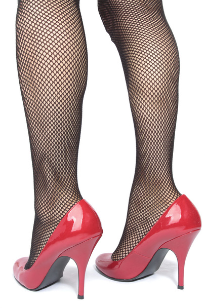 Beautiful woman legs tights with red heels over white backgro - Photo, image