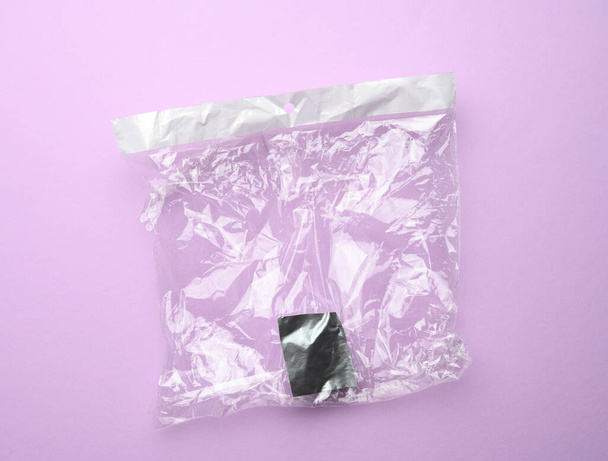 crumpled paper bag on a pink background - Photo, image