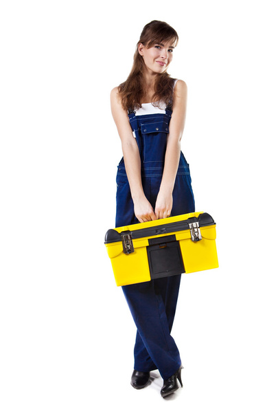 Pretty woman in coveralls with the case - Фото, зображення