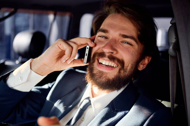 business man talking on the phone official trip to - 写真・画像