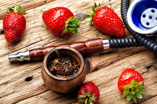 Oriental smoking hookah with a taste of chocolates. Chocolate tobacco flavor. - Foto, immagini