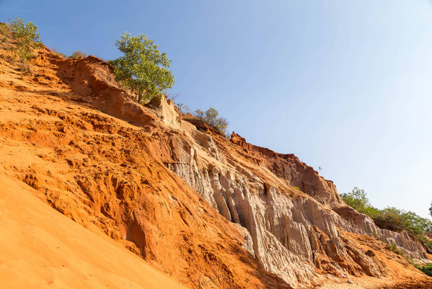 Beautiful red sand dune and sand formation in different colors. - Fotó, kép