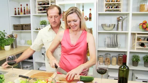 Wife and husband preparing meal - Footage, Video