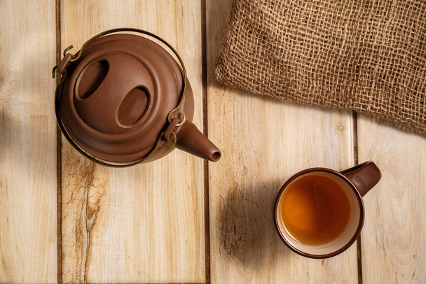 chocolate waffles and tea on wooden background . the view from the top - 写真・画像