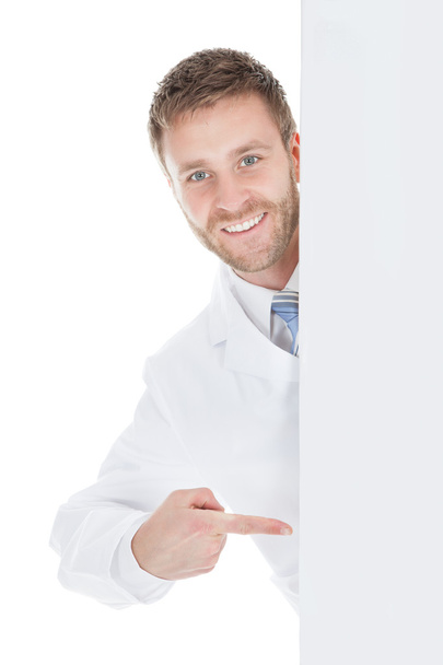 Doctor Displaying Billboard - Foto, afbeelding