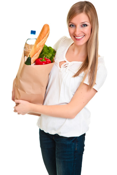 Женщина с пакетом продуктов, изолированных на белом
 - Фото, изображение