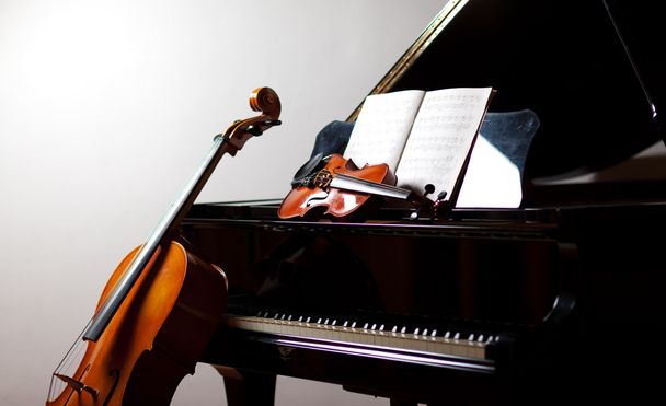 Cello, violin, piano and score - Фото, зображення