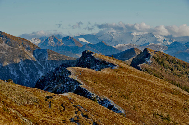 over all tops. the track follows the ridge over all tops in the low mountain range in the slate alps in the range of Salzburg. An autumn Impression - Valokuva, kuva