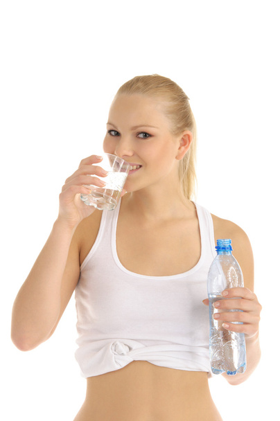 Happy woman drinks water from a glass - Fotografie, Obrázek